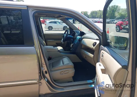 2010 Honda Pilot Touring z USA, uszkodzony, nr VIN 5FNYF4H91AB009014